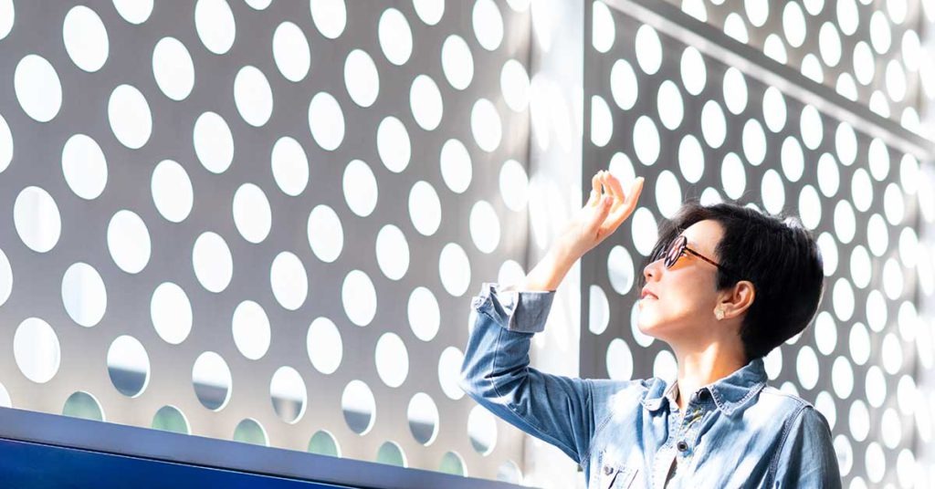 Asian woman UV light protection sunlight skin care